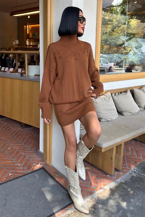 Model wearing The Amber Knit Set with boots
